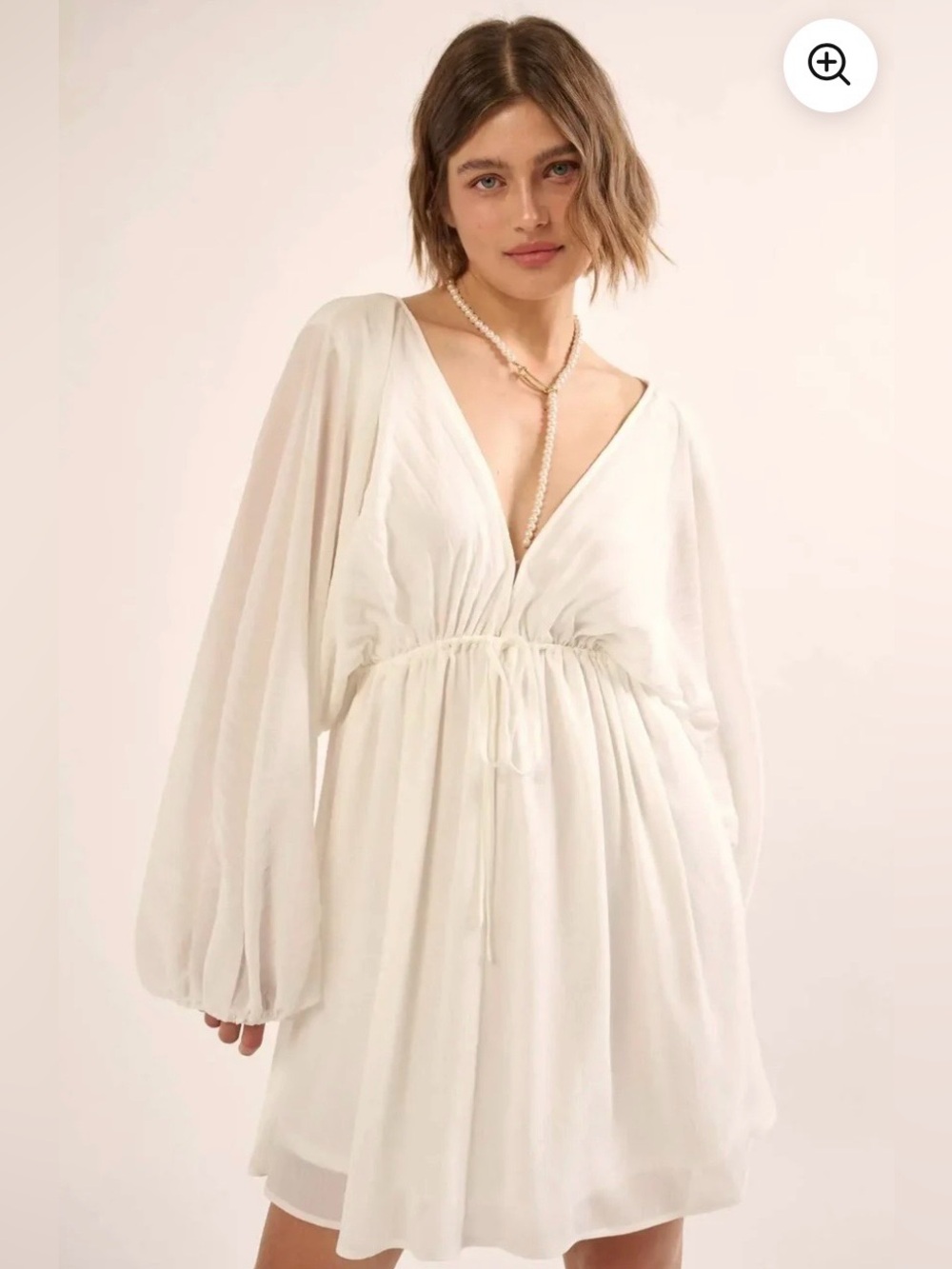 Promesa Ripple Effect Accordion Pleated Flowy V-Neck Long Sleeve Mini Dress